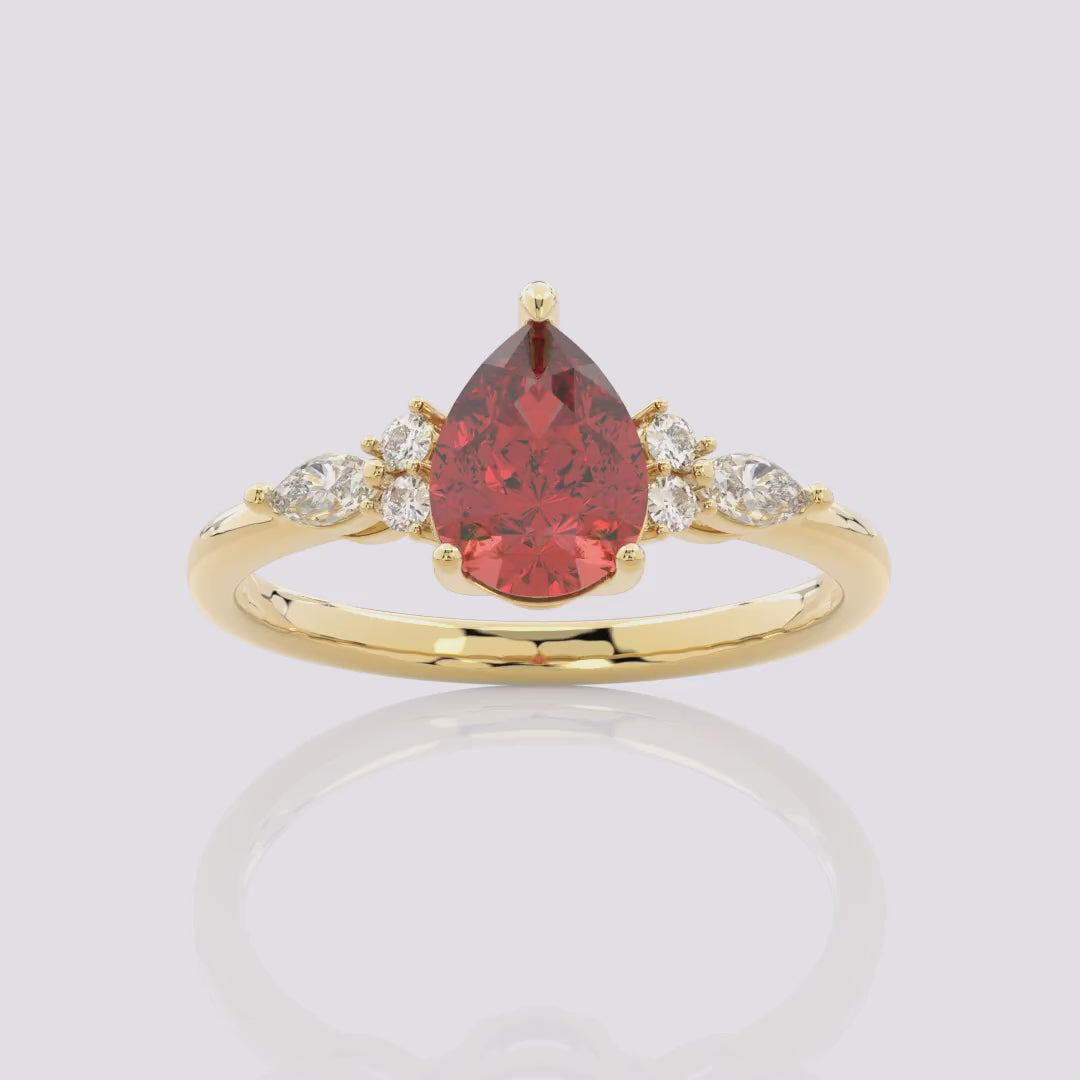 Garnet Melody Side Stones Pear Ring