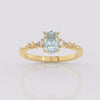 Aquamarine Ellipsis Side Stones Oval Ring